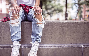 distressed blue denim jeans, jeans, ripped clothes, shoes, model