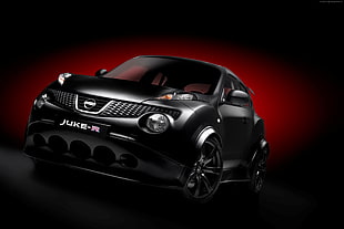 black Nissan Juke-R with black and red background
