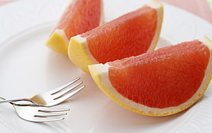 three slices of yellow fruits
