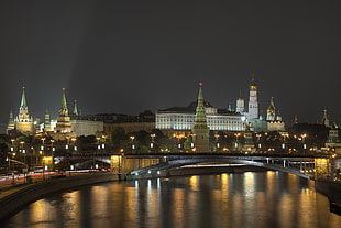 building and river during night time, moscow kremlin