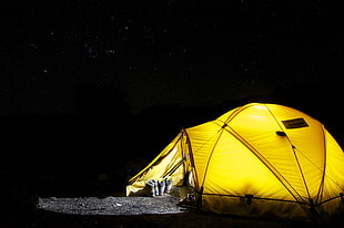 yellow camping tent during nighttime