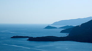 brown island hills, photography, landscape, nature, sea HD wallpaper