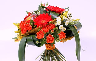 green, red, and yellow flower bouquet