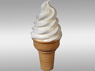 vanilla ice cream on brown cone