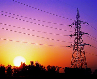 photo of electric tower during golden hour HD wallpaper