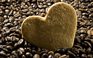 heart shape cookie on coffee beans HD wallpaper