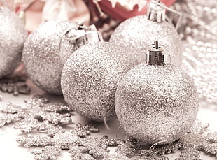 close-up photography of gray glittered baubles