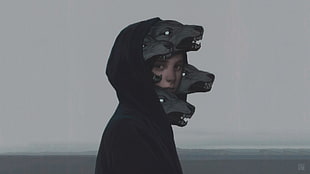 boy wearing black hoodie with wolf on head
