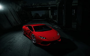 red sports car on a dark place HD wallpaper