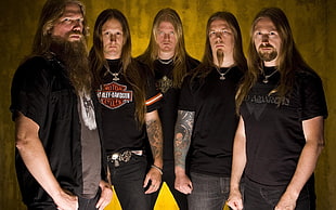 group of men wearing black shirt