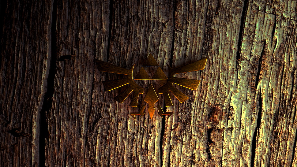 gold eagle badge on tree stem wallpaper HD wallpaper
