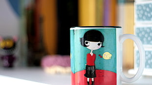 closeup photo of woman in red dress graphic ceramic mug