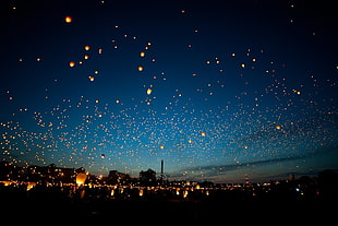 flying lanterns during night time