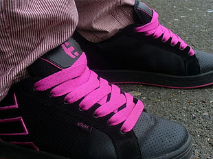 pair of black-and-pink Nike basketball shoes, shoes