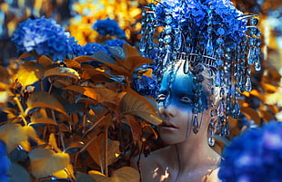woman wearing blue headdress