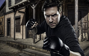 man with black leather gloves