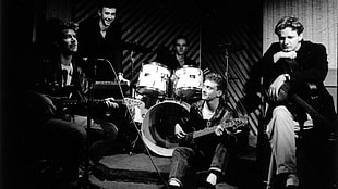 greyscale photo of musical band