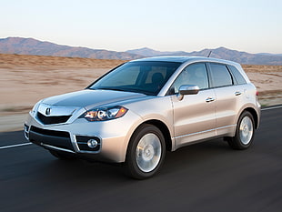 timelapse photography of silver Acura RDX along highway during daytime HD wallpaper