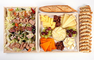 assorted cheeses and sliced bread
