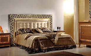 beige and brown bedspread