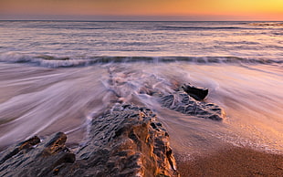close up photograph of body of water during sunset