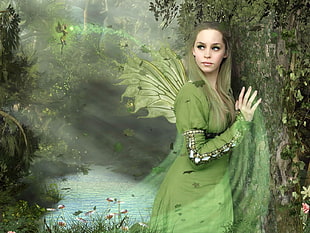 green fairy beside tree