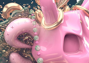 macro photography of pink ceramic figurine