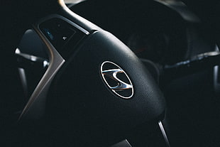 black Hyundai steering wheel