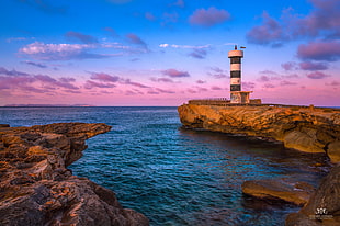 lighthouse on a cliff, mallorca, spain HD wallpaper