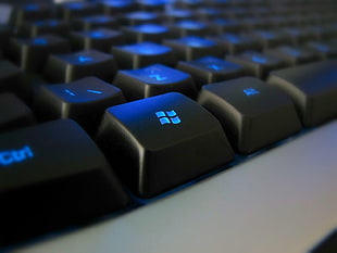 closeup photo of window key at keyboard