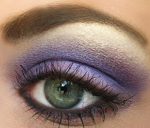 woman with purple eye shadow