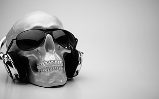 black framed aviator sunglasses, headphones, skull, sunglasses, audio