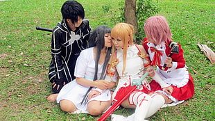 four cosplayer on different character costumes