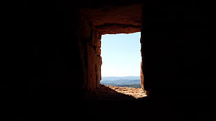 brown stone cave, cave, window