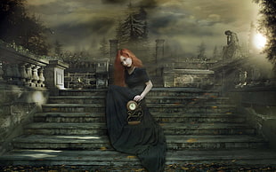 woman wearing black dress holding table clock