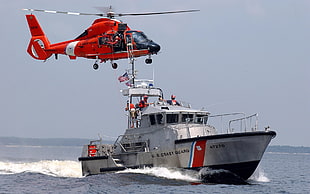 gray and black speedboat, ship, coast guards, helicopters, vehicle