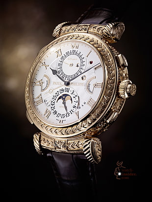 round gold-colored chronograph watch with brown leather band, watch, Patek Philippe, luxury watches