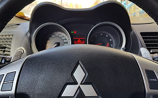 Mitsubishi steering wheel closeup photo
