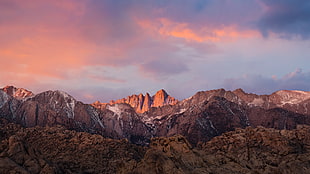 brown mountain during sunset