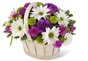 Daisies and Chrysanthemums in beige wooden basket