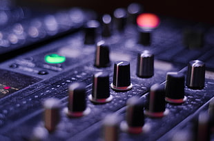 selective focus photography of audio mixer