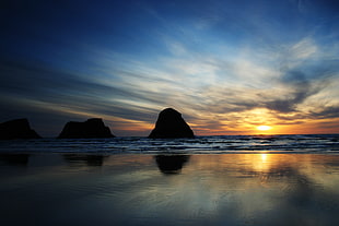 photography of sea shore during sunset, cannon beach