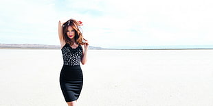 woman in black sleeveless dress in white sand HD wallpaper