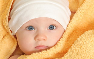 baby wearing white knit cap HD wallpaper