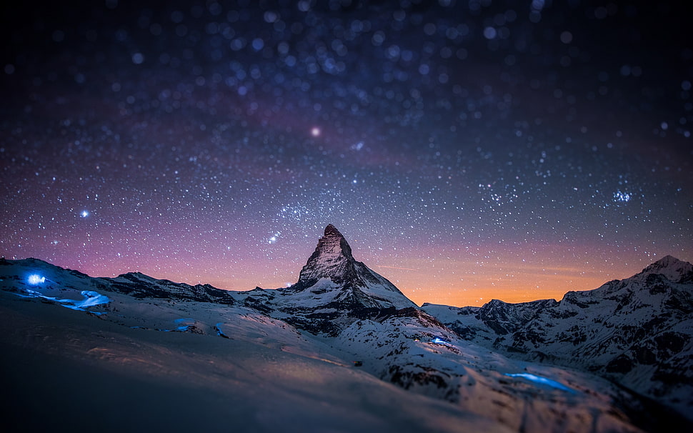 star gaze over mountain cover in snow HD wallpaper