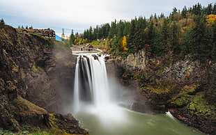 time lapse and landscape photography of water falls surrounded by pine trees HD wallpaper