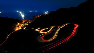 gray pave road, road, long exposure, hairpin turns, light trails