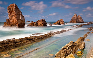 brown rock formation, nature, sea, Spain, Playa de la Arnía HD wallpaper