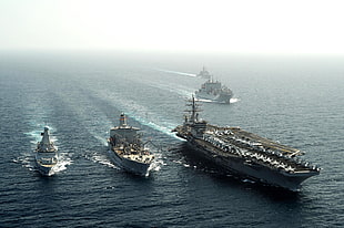 four aircraft carrier ships on ocean HD wallpaper