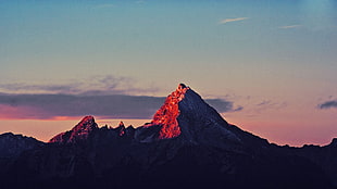 mount silhouette during golden houre